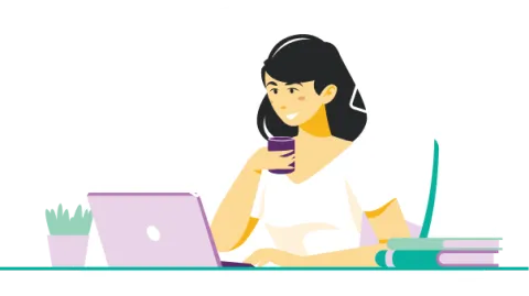 FSL teacher working at laptop